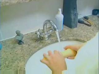 Breasty blond MILF sucks and gets drilled for spunk flow in bathroom